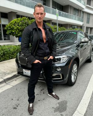 Black Bomber Jacket with Deep V-Collared Shirt