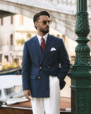 Blue Double-Breasted Blazer with White Linen Trousers