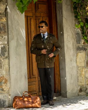 Olive Green Field Jacket with Dark Trousers