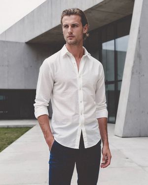 White Shirt with Dark Jeans and White Sneakers